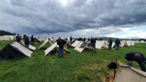 Wide View of triangular tents on a plain
